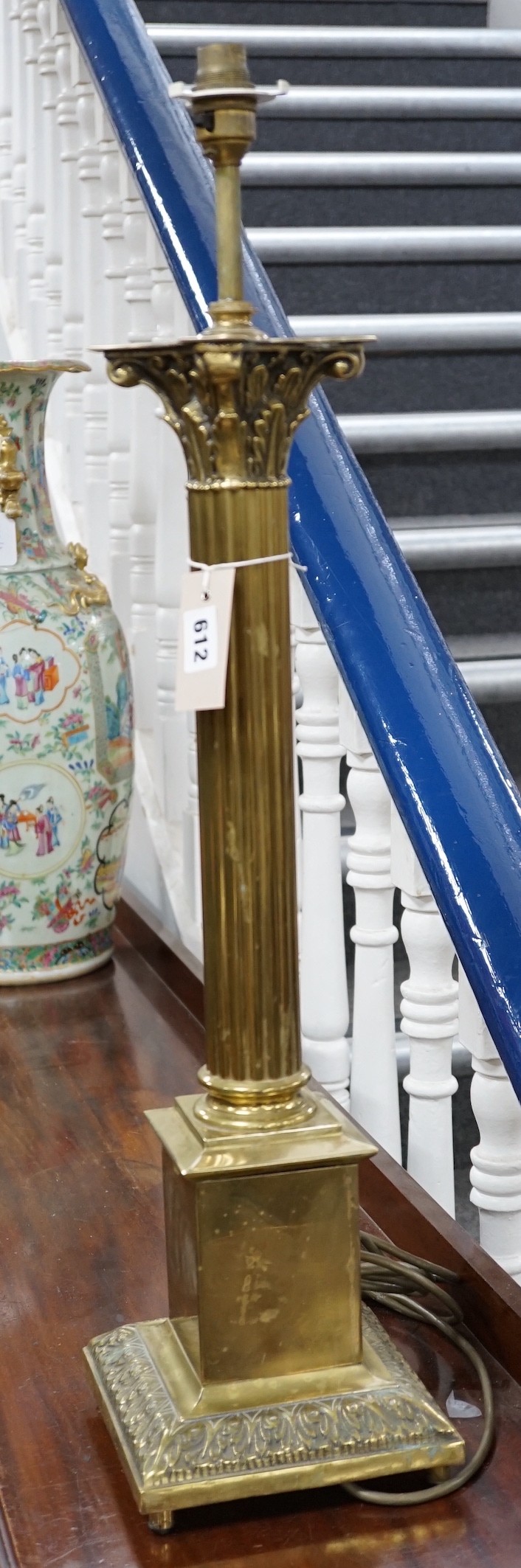 A brass Corinthian column lamp base, 74cm overall